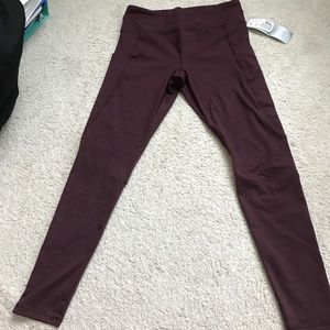 Never worn maroon leggings with side pocket